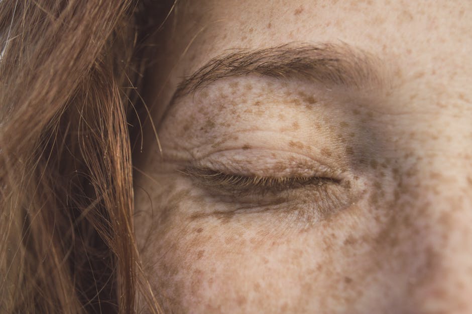 person closing their eyes