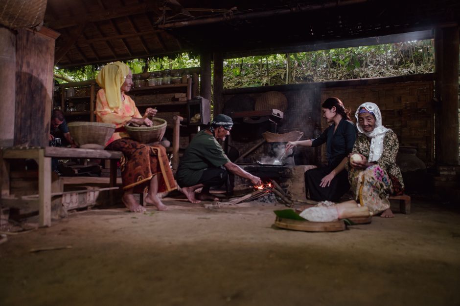 people engaged in cooking and cuisine