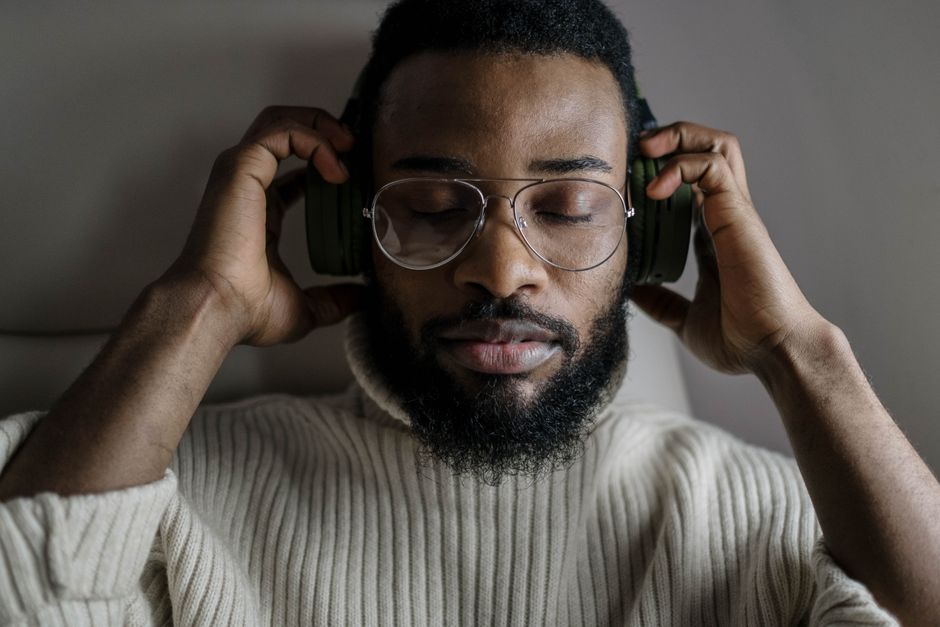 person listening to music