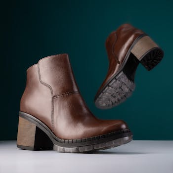 pair of leather shoes on white background
