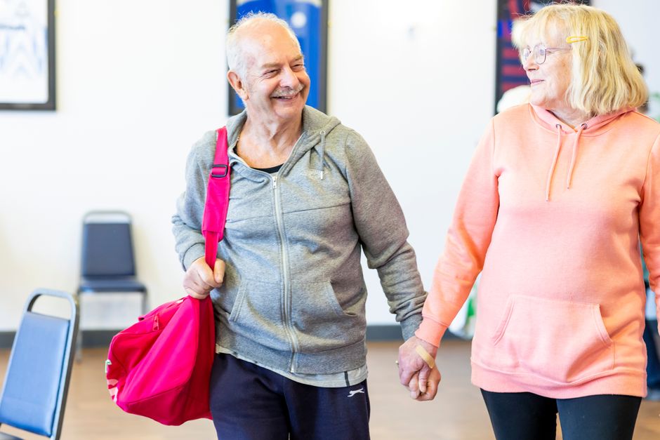 people engaged in exercise and wellbeing