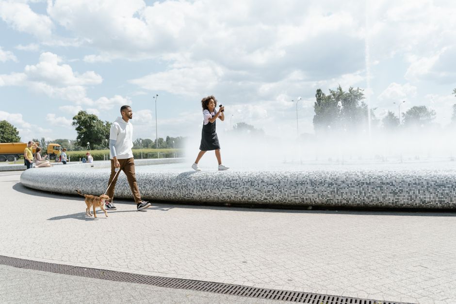 family with a dog in the park