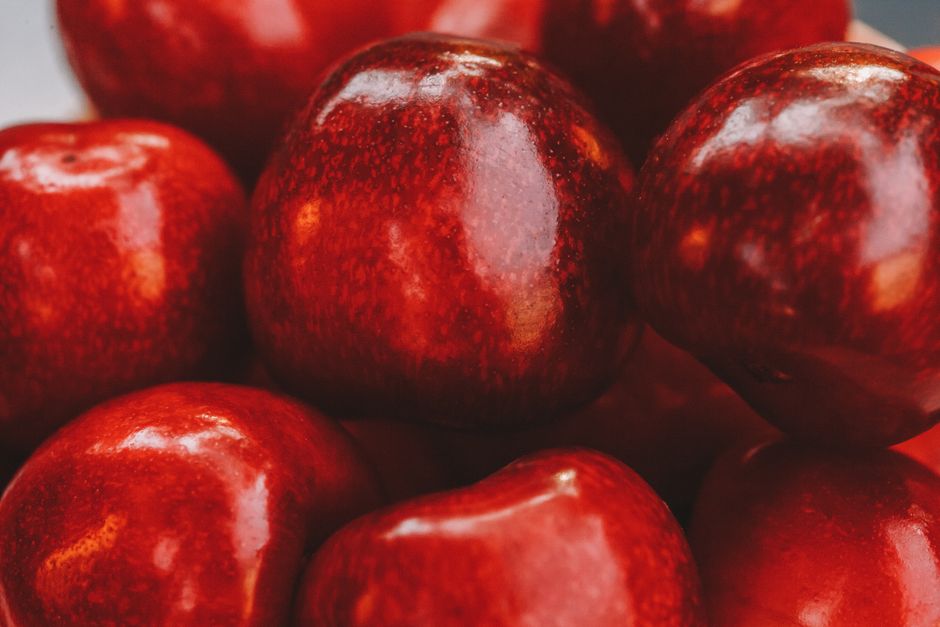 two similar images of fruits