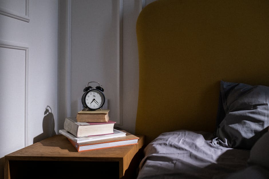 alarm clock on bedside table