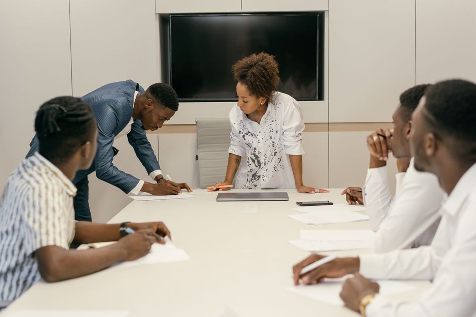 people engaged in making plans