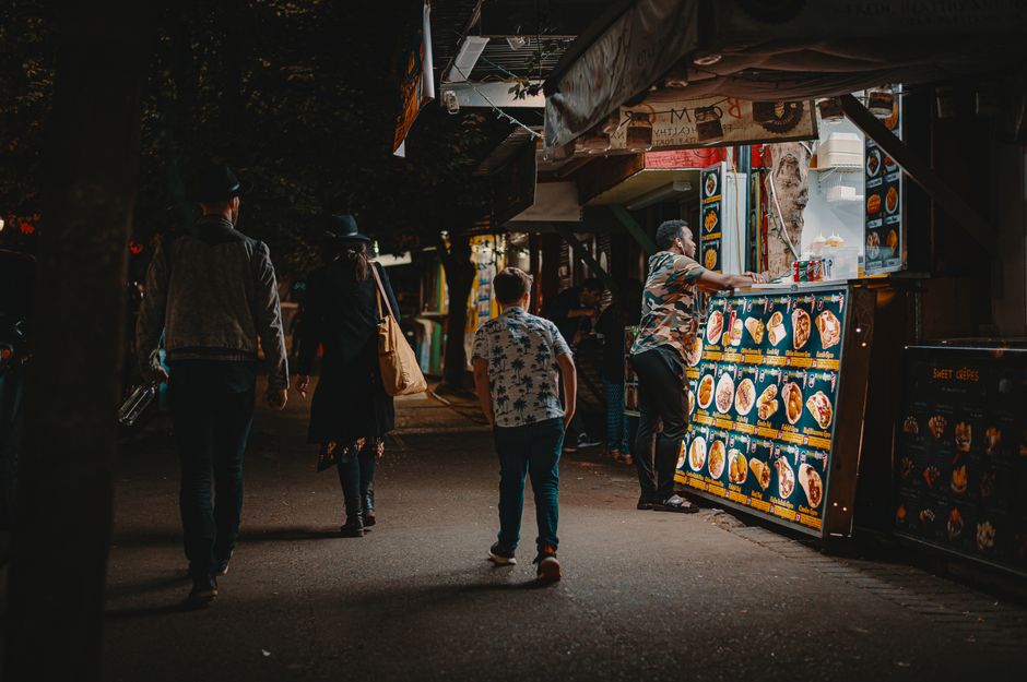 people engaged in ordering food abroad