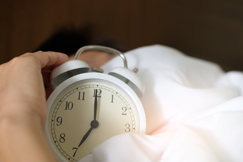 person waking up in bed