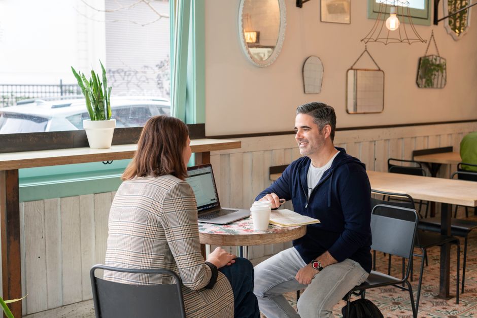 person talking in a café