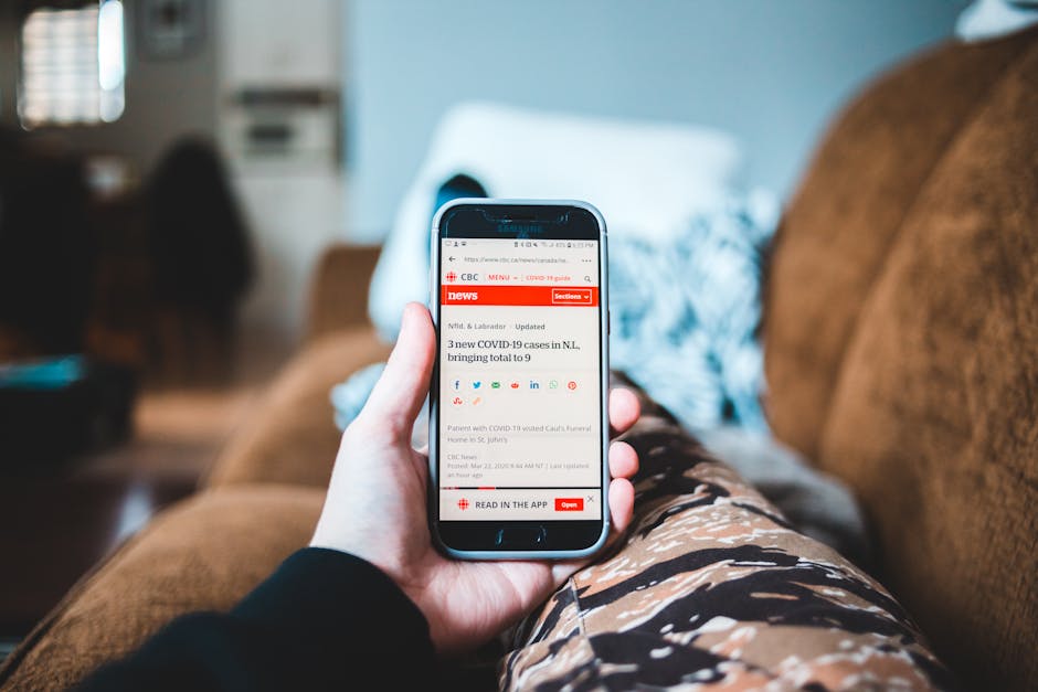 person reading news on a smartphone