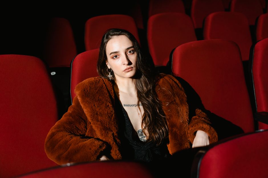 person thinking about a movie