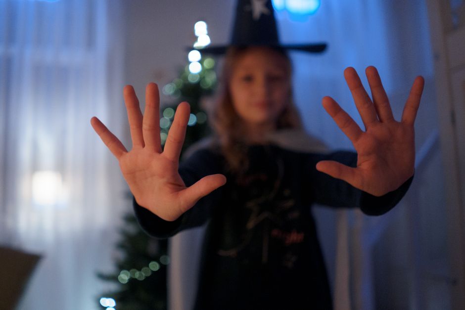 child showing eight fingers