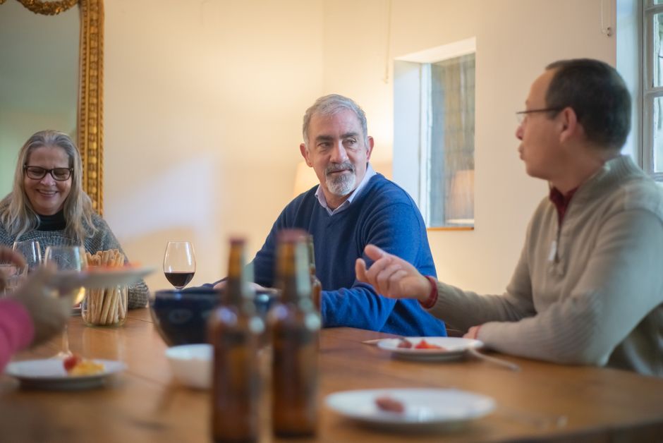 people engaged in talking about experiences