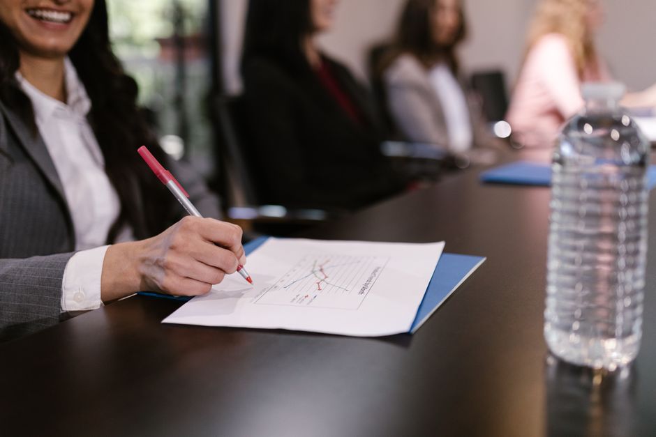 people engaged in writing reports